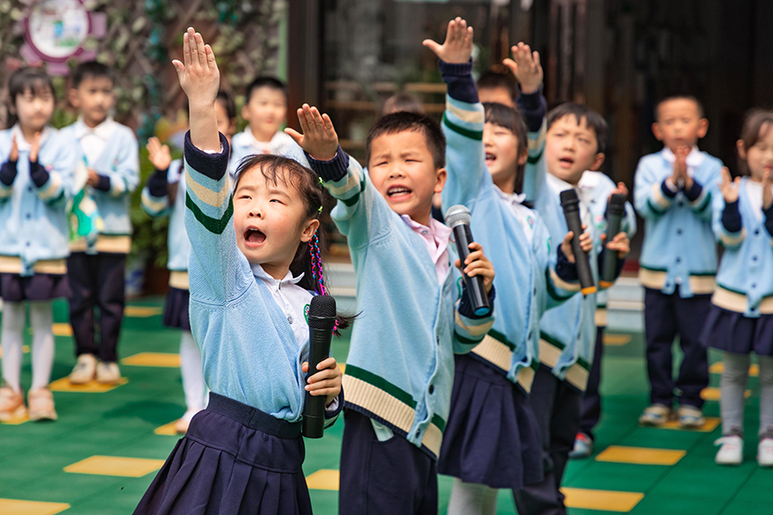 幼兒園舉辦“書香為伴 悅享童年”親子閱讀活動。朱國朝攝