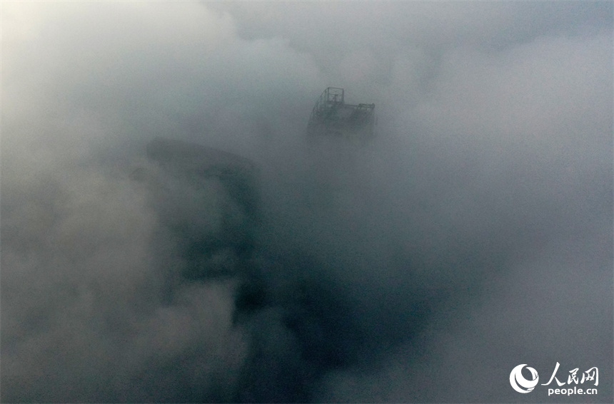 5日清晨，南昌被大雾笼罩。 人民网记者 时雨摄